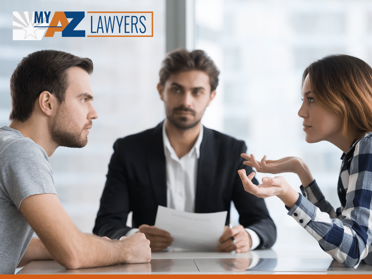 Spouses split up disputing about divorce settlement in Mesa divorce lawyers office