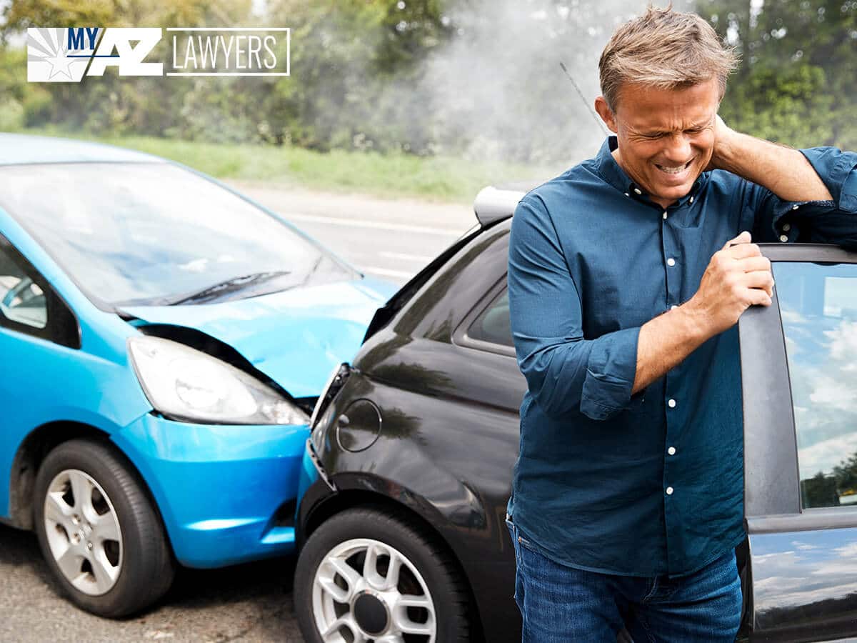 Injured Man Getting Out Of His Car After An Accident In Mesa, AZ
