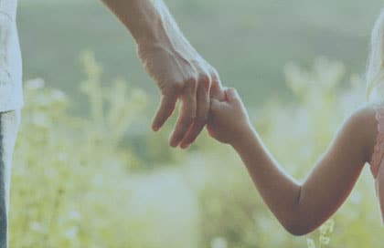 Child Holding Parent's Finger