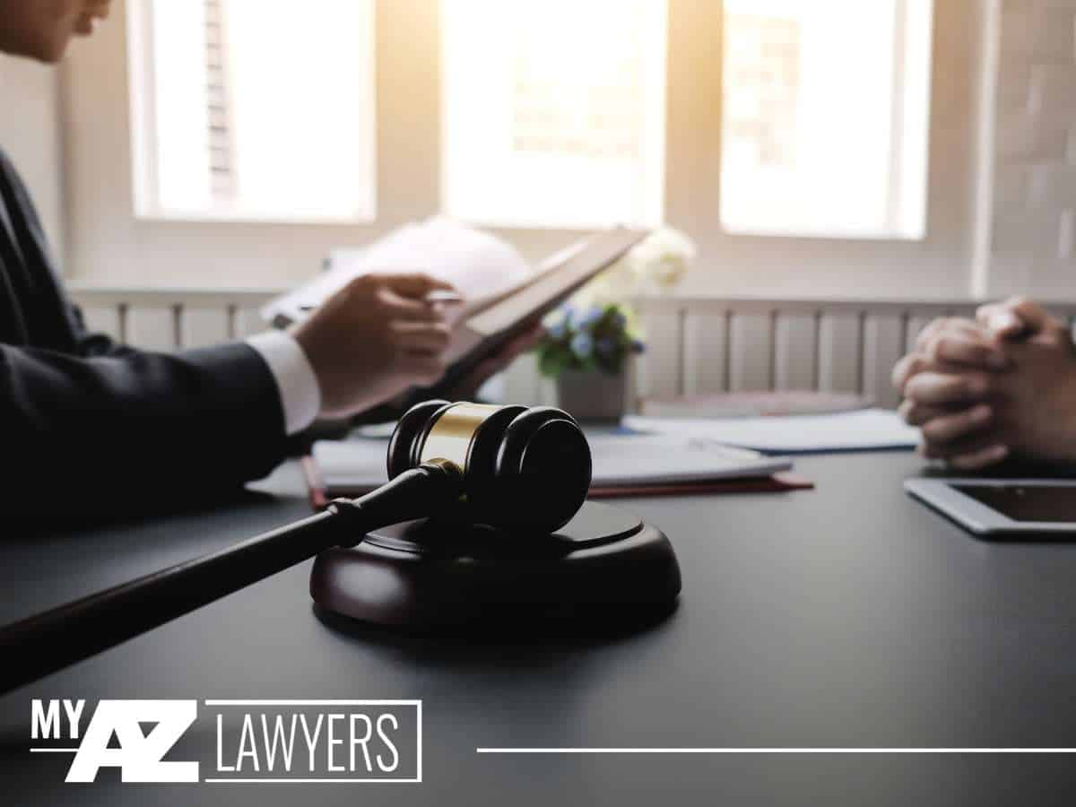 Legal consultation with gavel in foreground — related to Arizona’s Statutes of Limitations