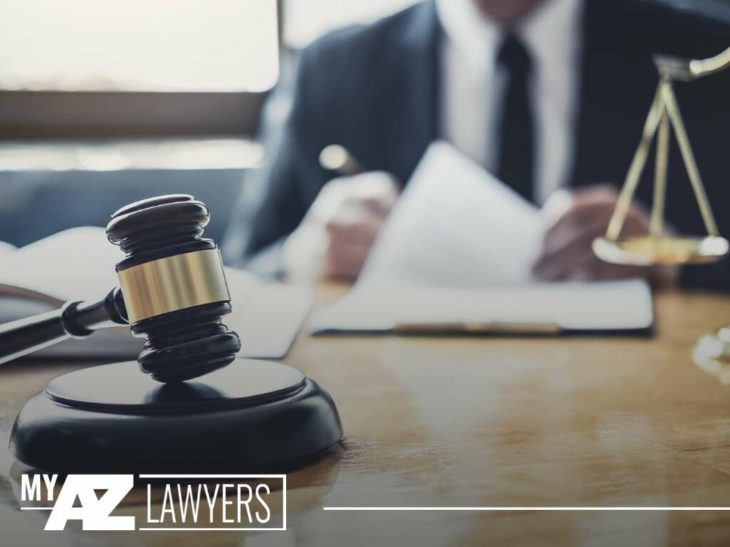 A lawyer reviewing documents with a gavel and scales of justice, symbolizing legal assistance for welfare fraud criminal charges